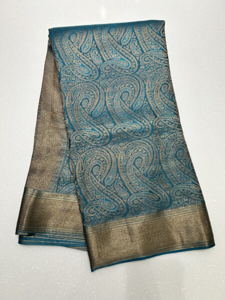 Teal Blue Banarasi Crepe Rajgharanaa collection saree